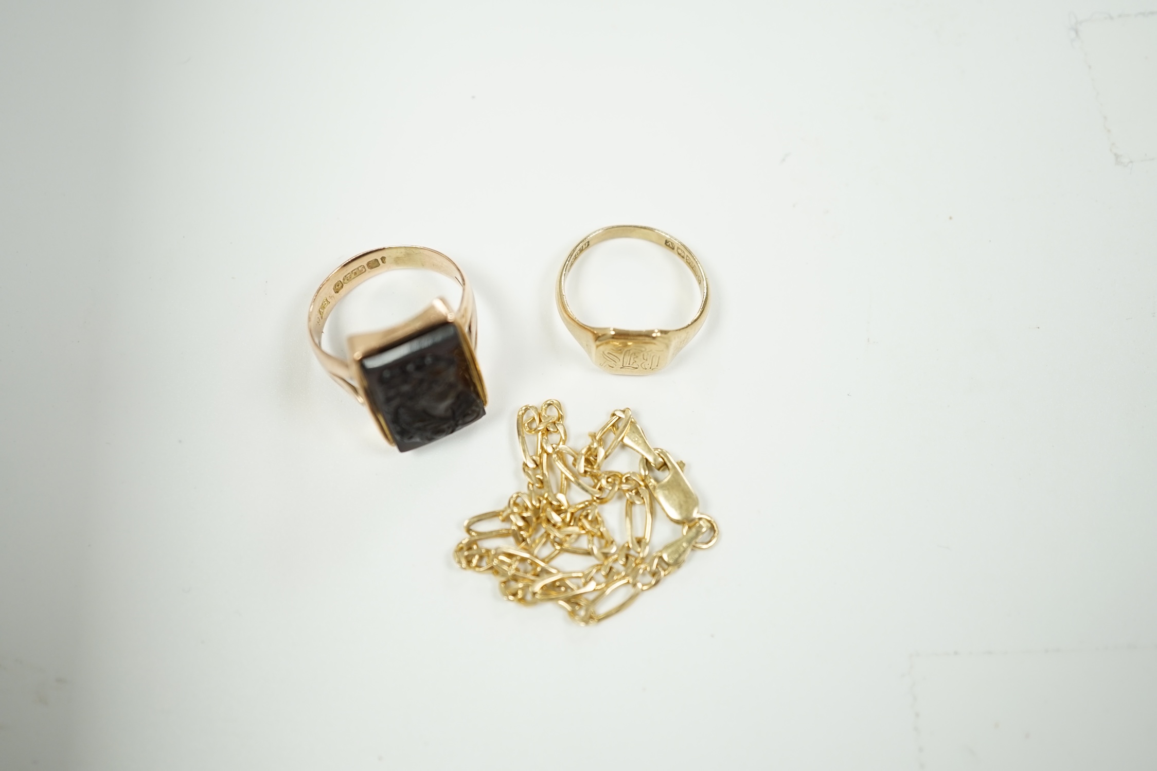 A modern 9ct gold and hardstone cameo set ring, size M, a small 9ct gold signet ring and an Italian 14kt bracelet